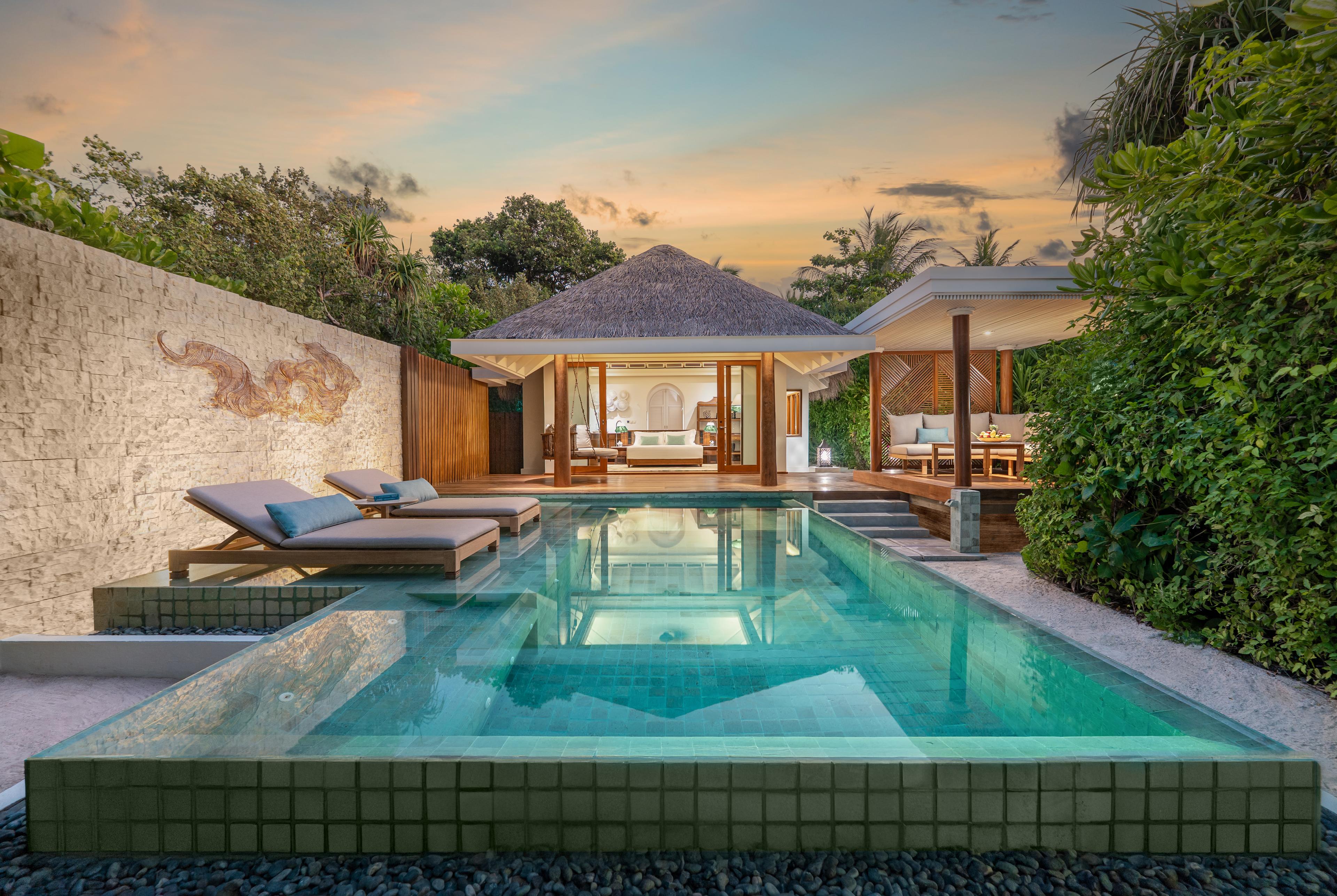 Anantara Kihavah - Beach Pool Villa Interior - Dusk.jpg
