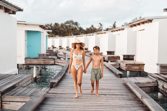 AqB mum and son overwater villa.jpeg