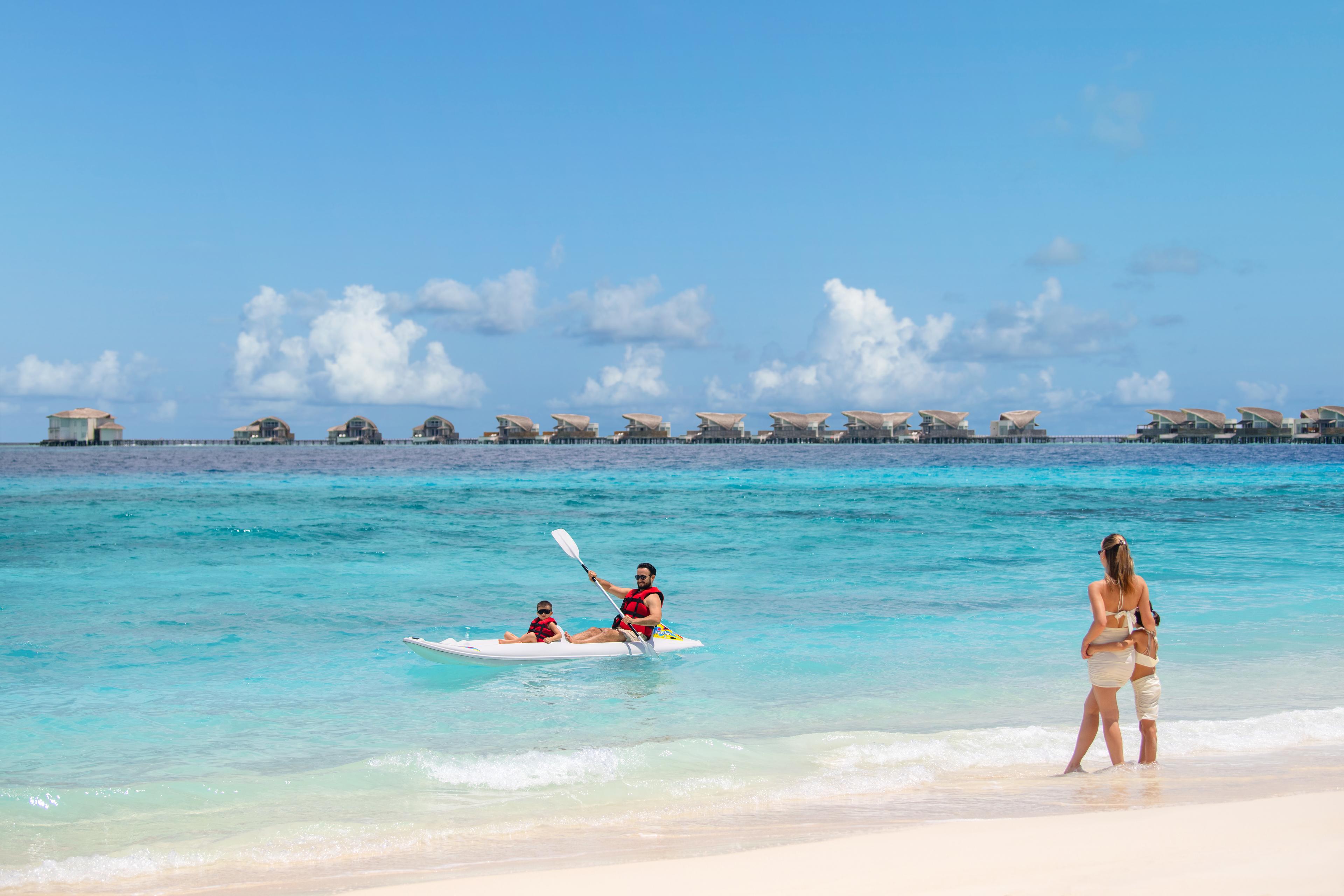 JW Marriott Maldives Resort & Spa_Family on Beach.jpg