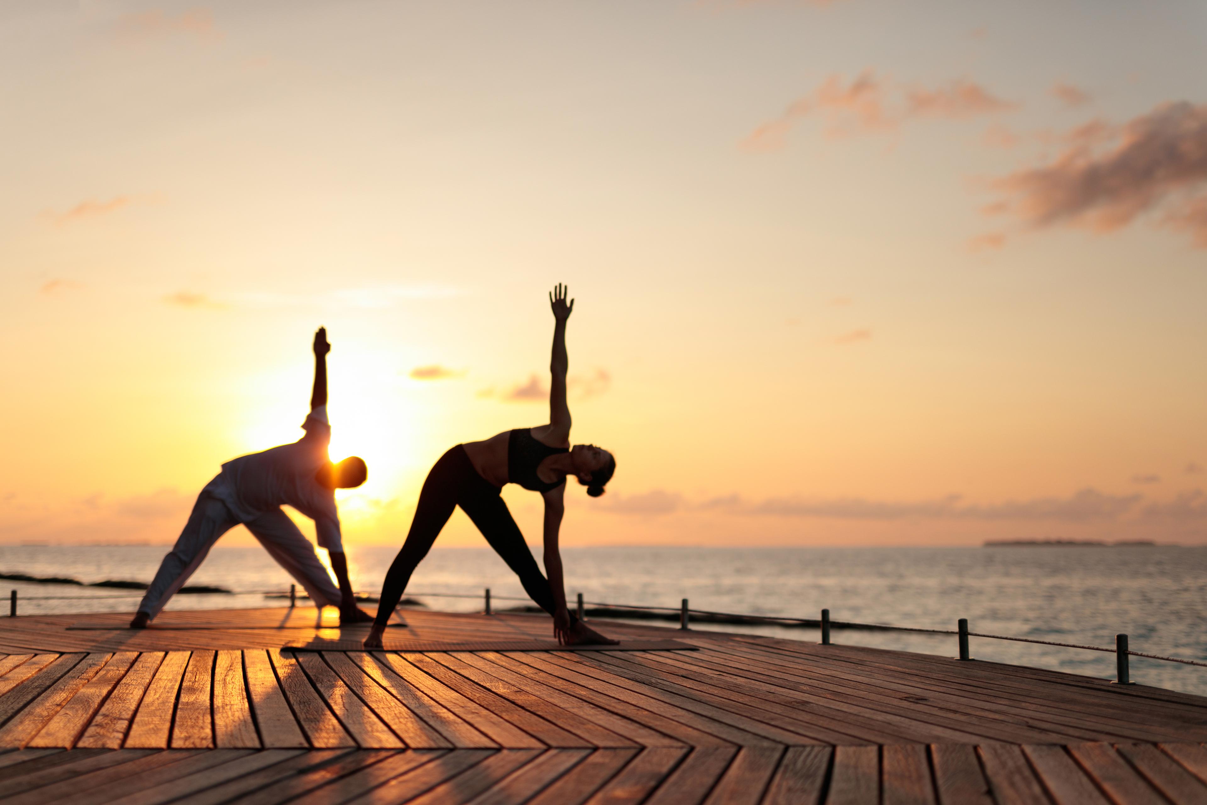 Baros Maldives_Sunrise Yoga on LH Deck (7).jpg
