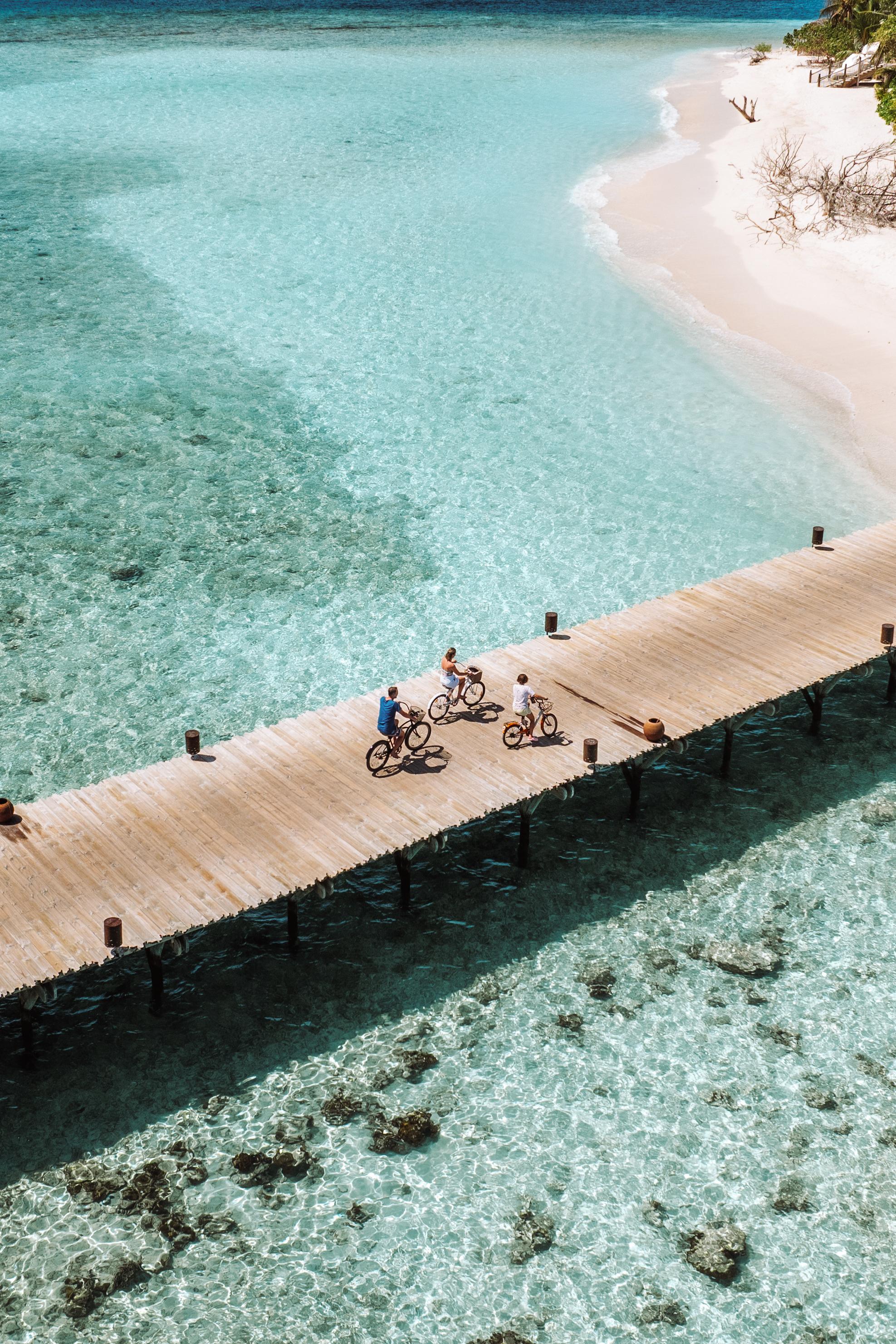 Soneva Fushi - Family - Biking on Jetty (1).jpg