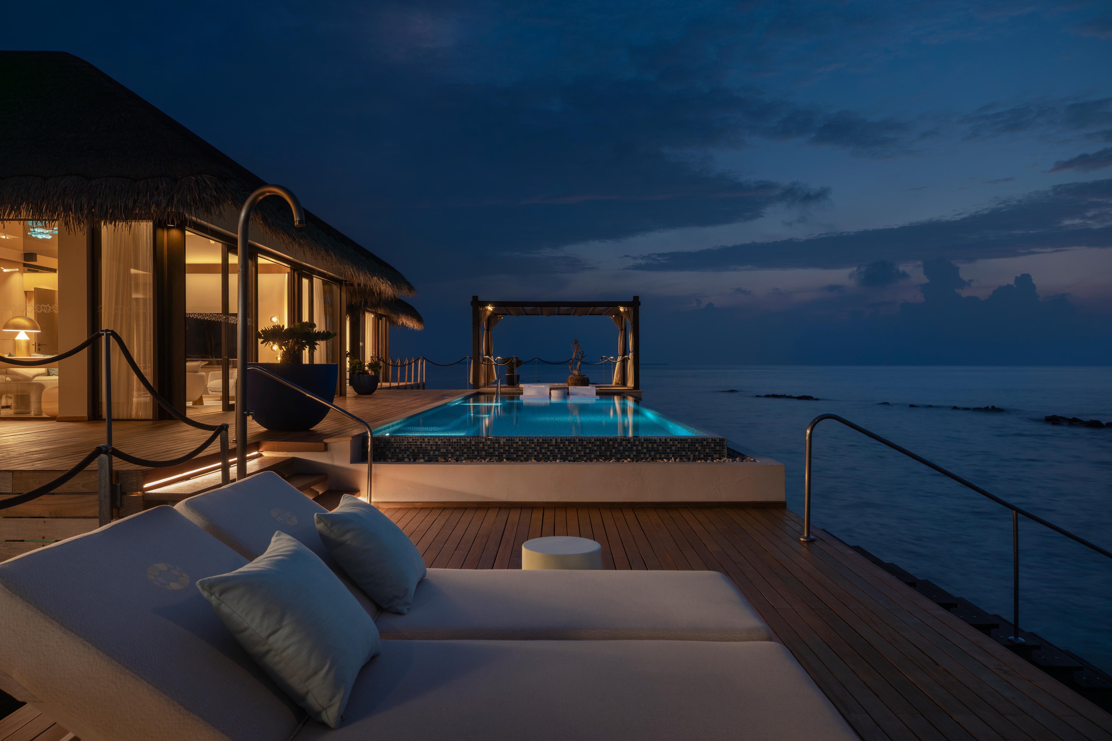 Velaa Private Island - Ocean Pool House Sunset.jpg