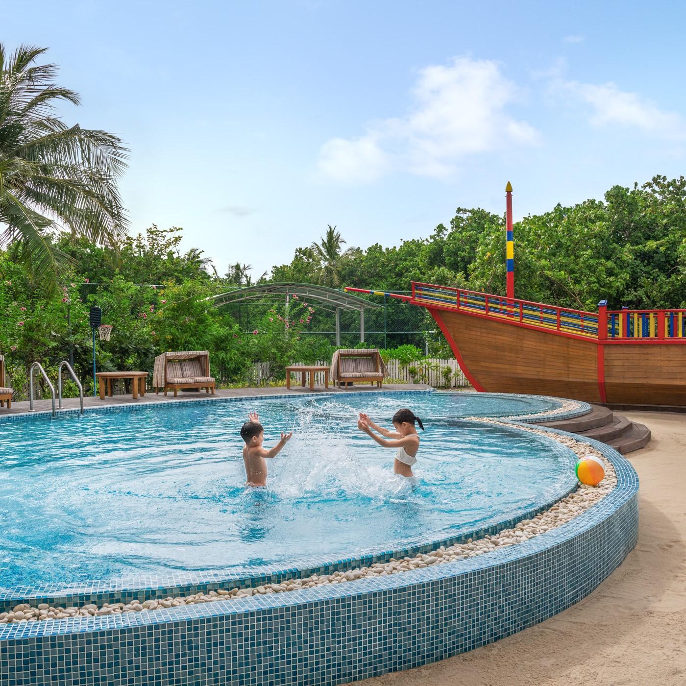 JW Marriott Maldives - Lifestyle - Kids playing in the swimming pool .jpg