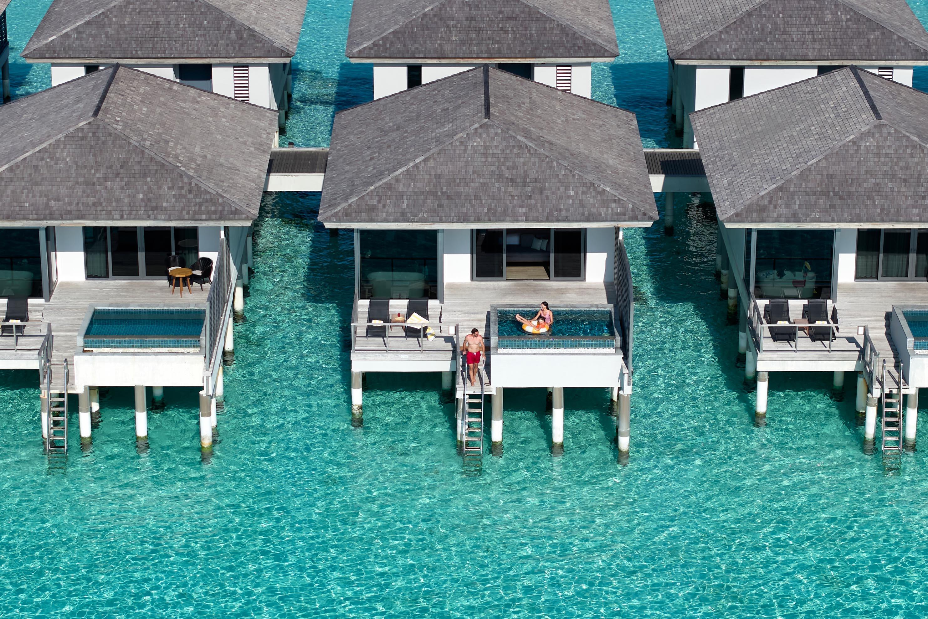 Le Meridien Maldives Resort and Spa - Family - Overwater Villa with pool aerial.jpg