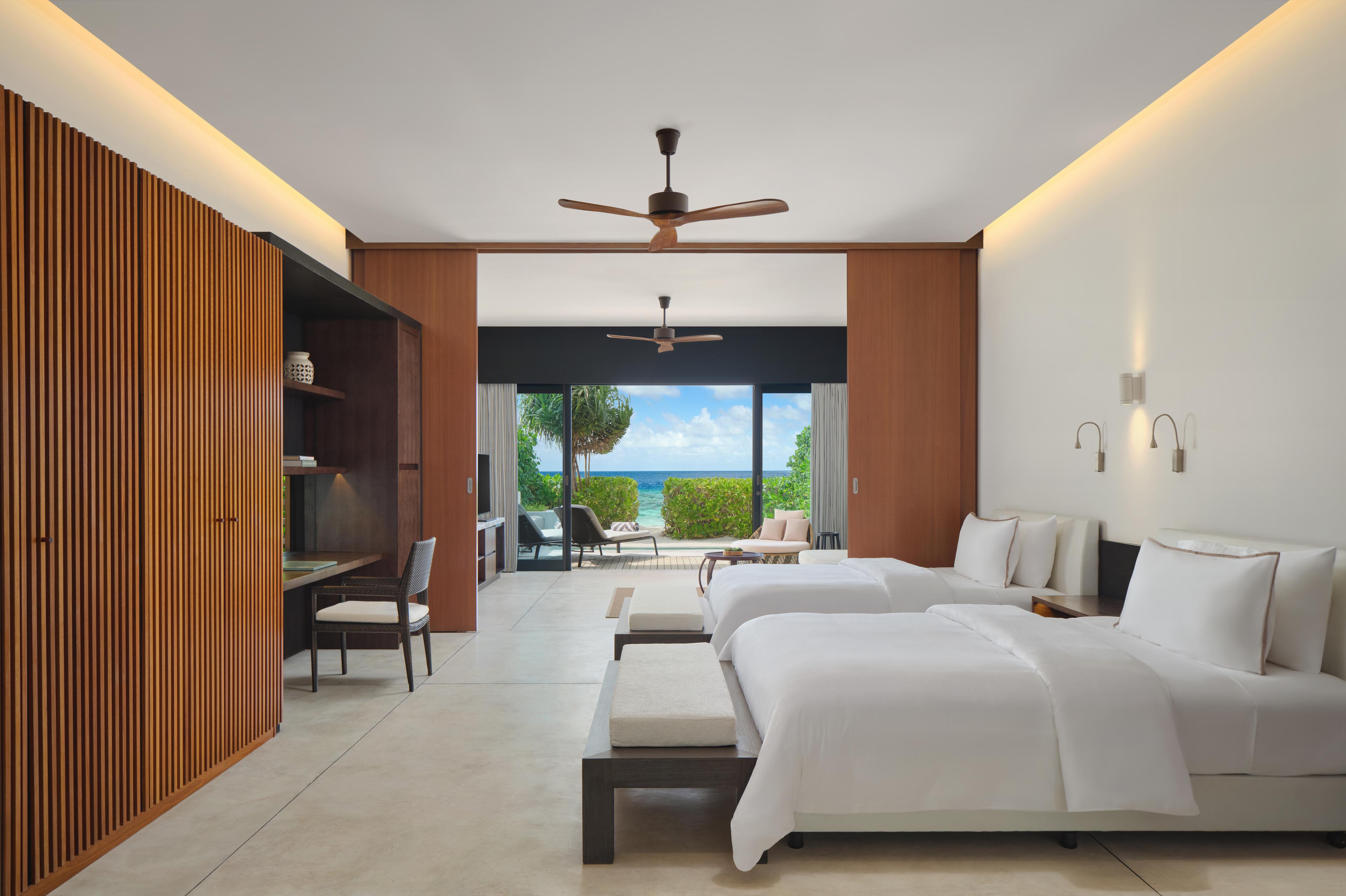 The Westin Maldives Miriandhoo Resort - Family Deluxe Beach Villa Bedroom.jpg