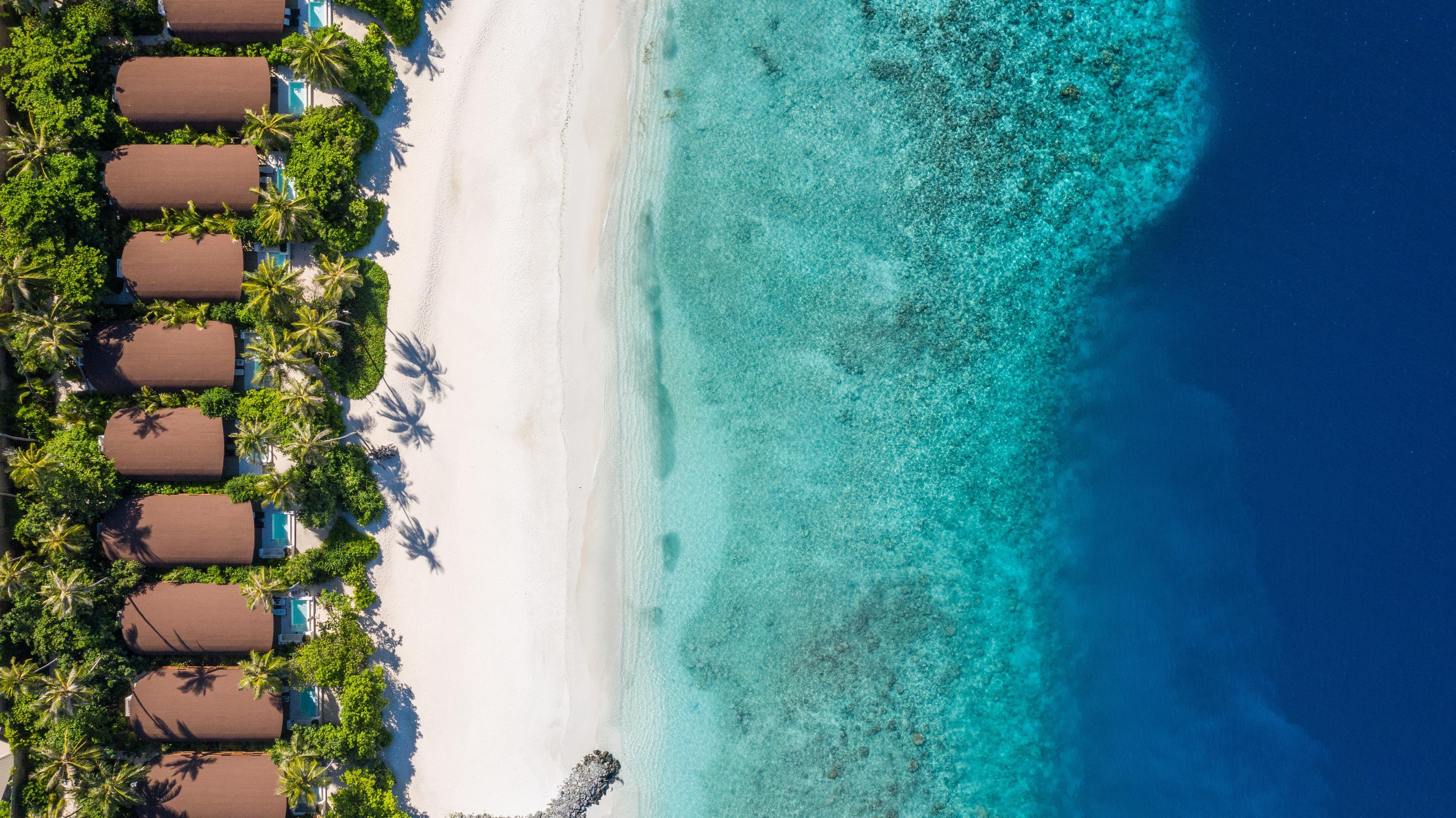 The Westin Maldives Miriandhoo Resort - Beach Aerial.jpg